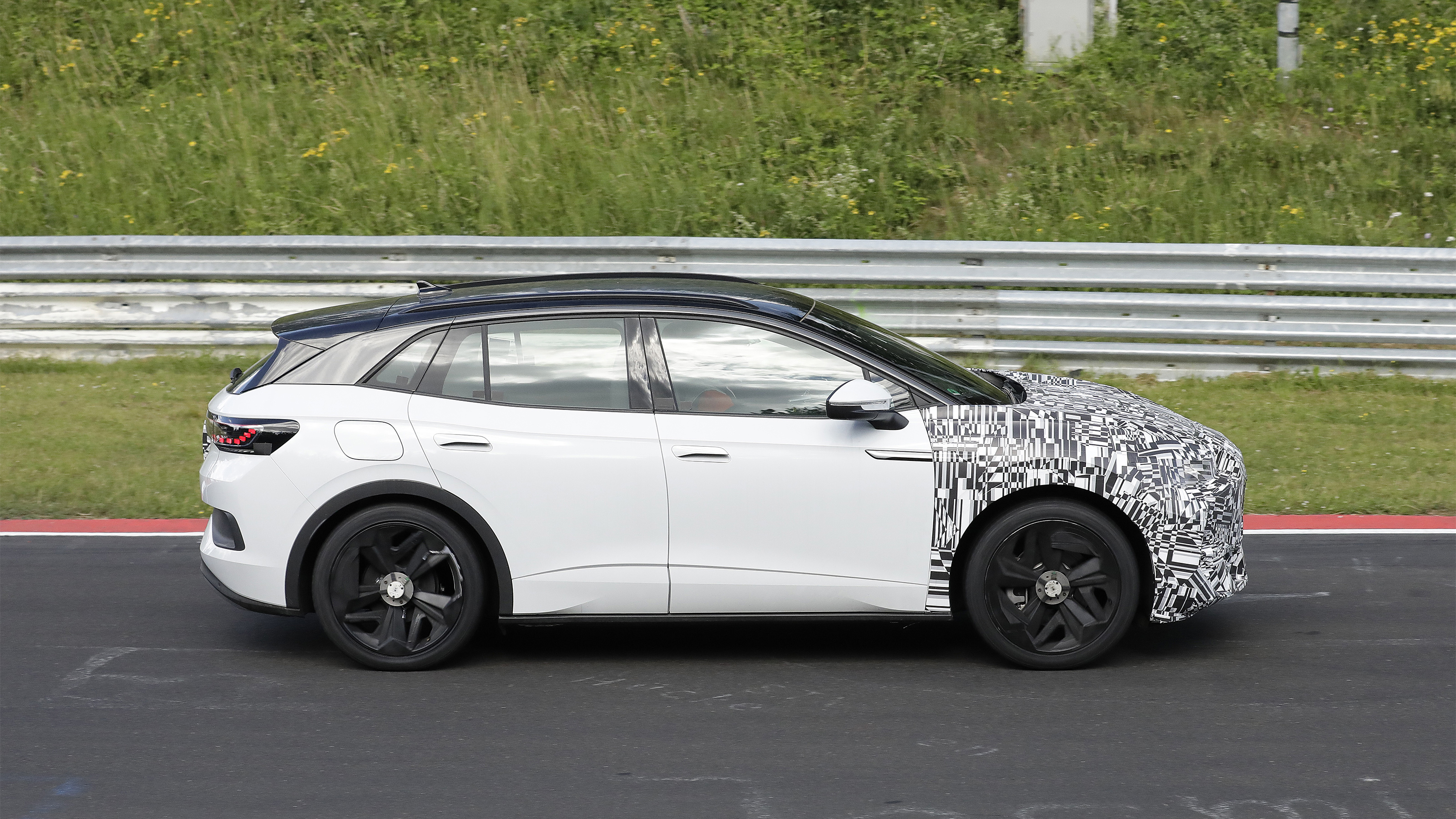 Cupra Tavascan track testing side