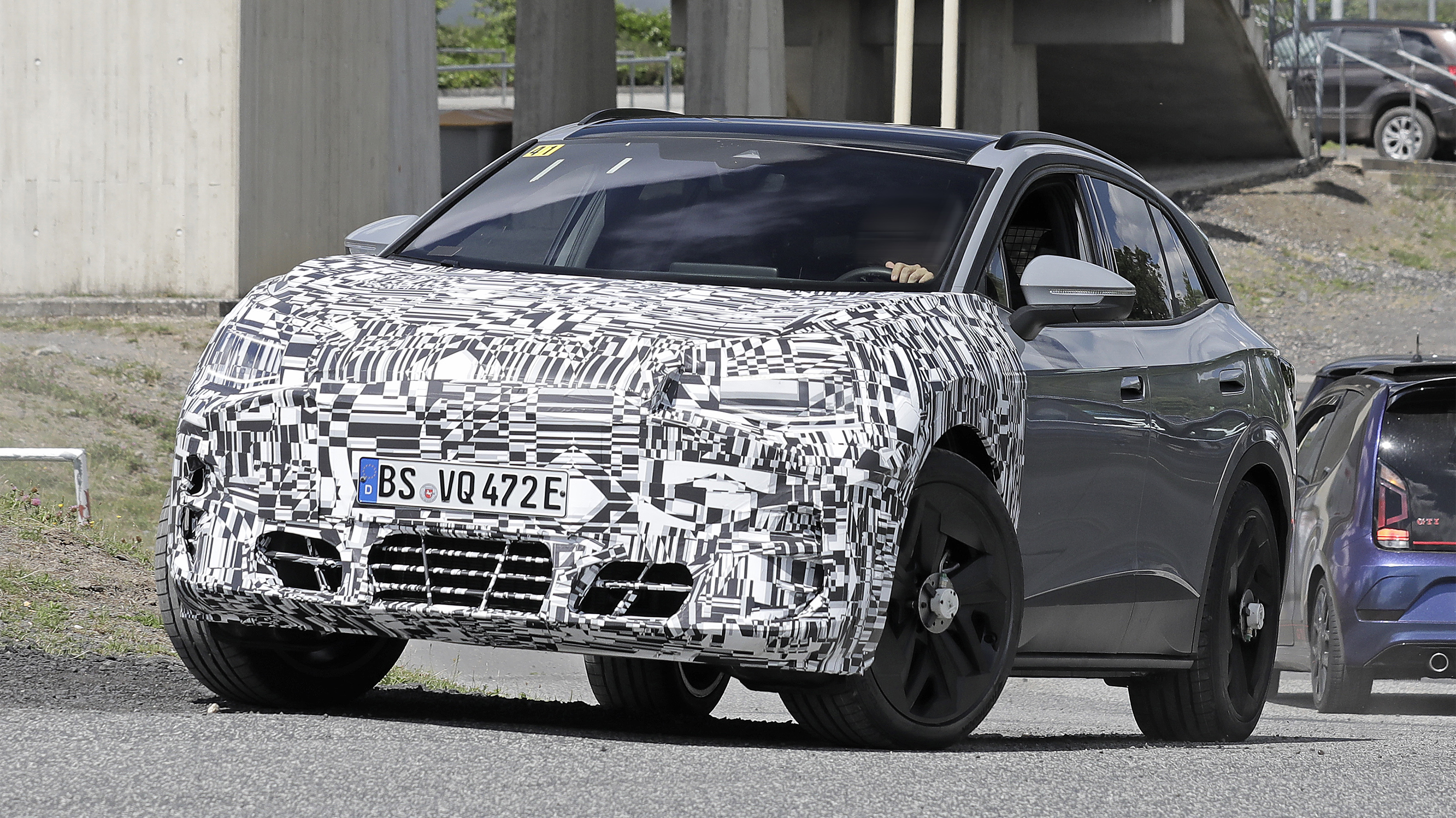 Cupra Tavascan testing front passenger side