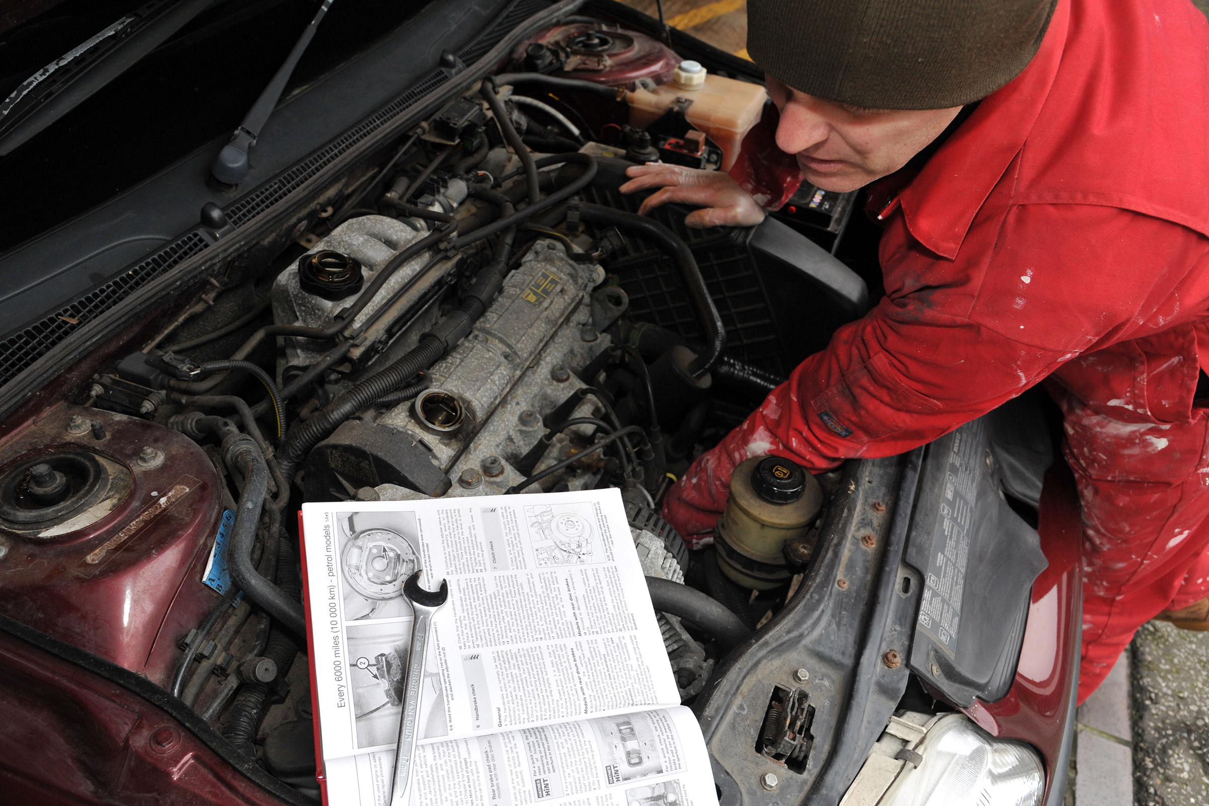 Mechanic working on car