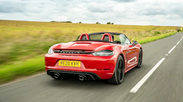 Porsche 718 Boxster convertible rear 3/4 tracking