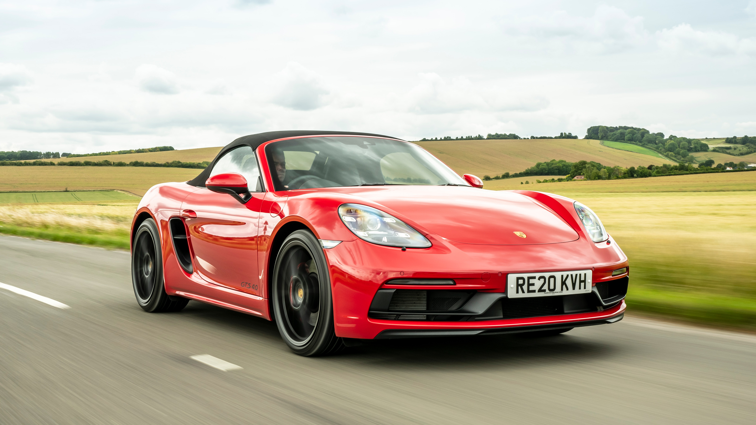 Porsche 718 Boxster convertible front 3/4 tracking
