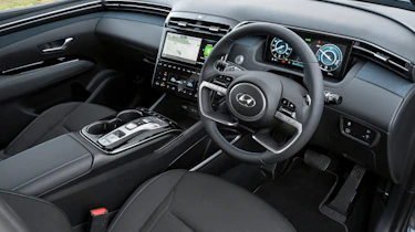 Hyundai Tucson SUV front 3/4 tracking
