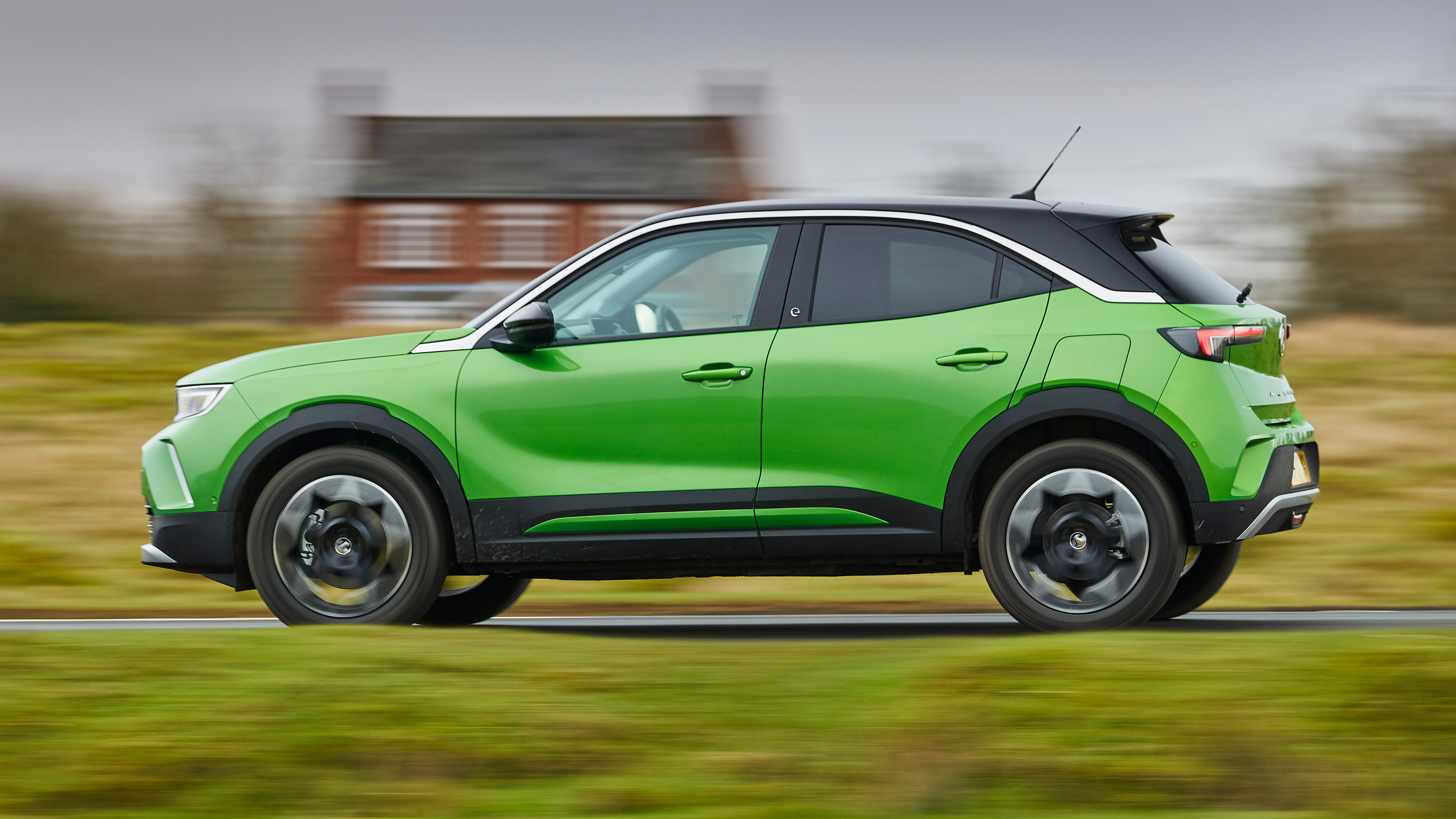 Vauxhall Mokka-e driving - side view
