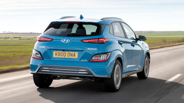 Hyundai Kona Electric SUV rear 3/4 tracking