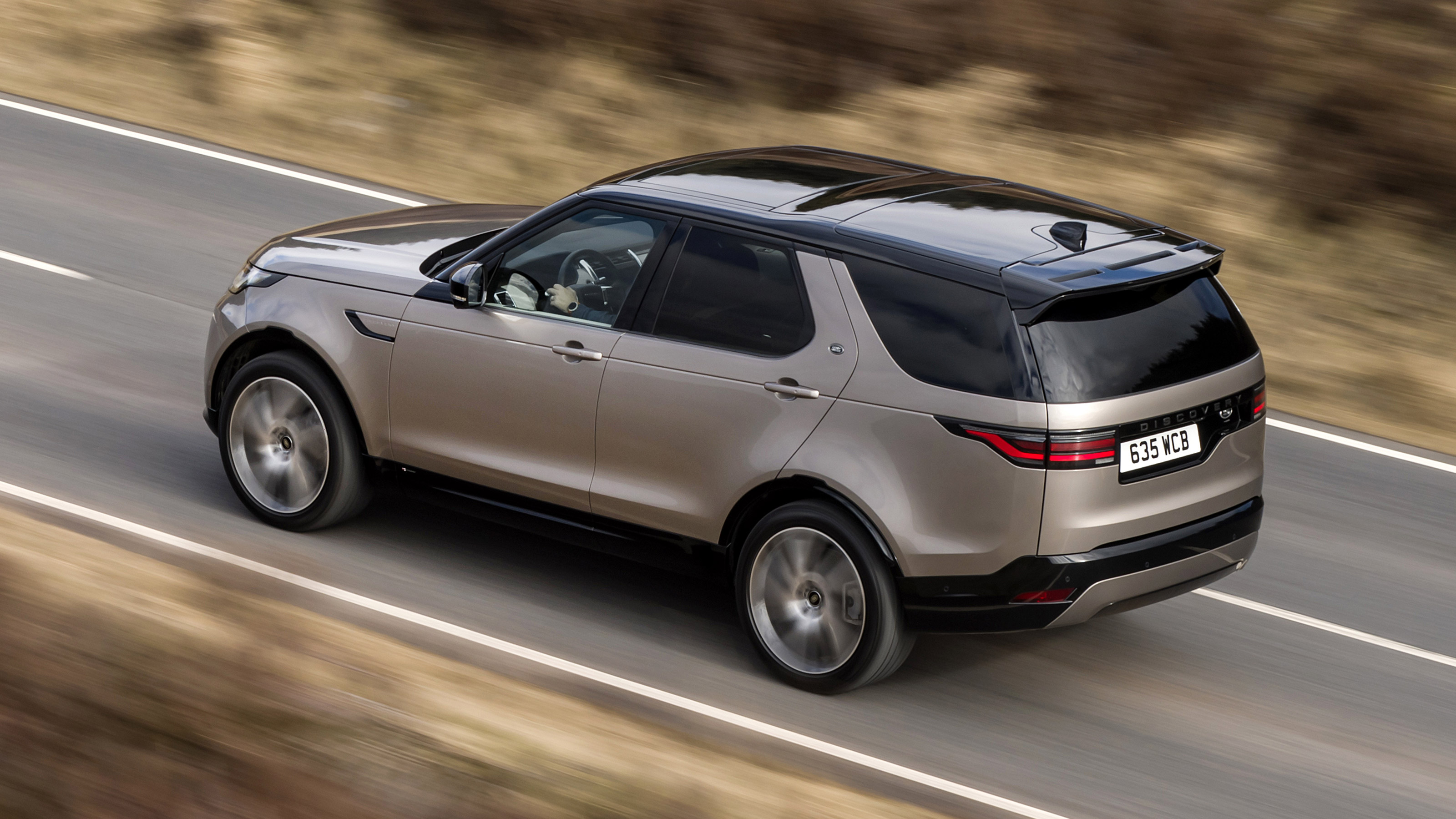Land Rover Discovery SUV rear 3/4 driving
