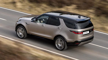 Land Rover Discovery SUV rear 3/4 driving