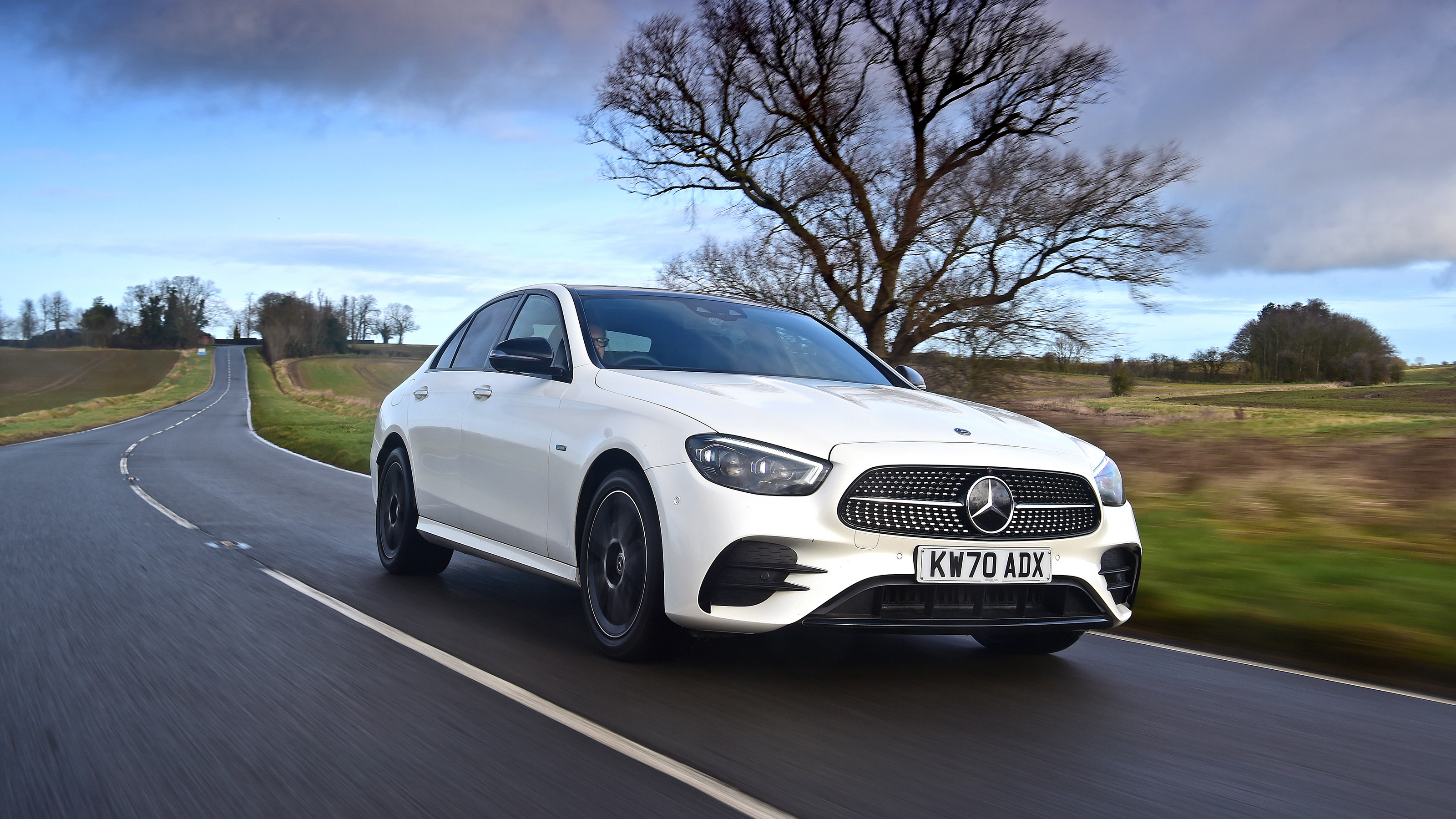 Mercedes E-Class hybrid front 3/4 driving