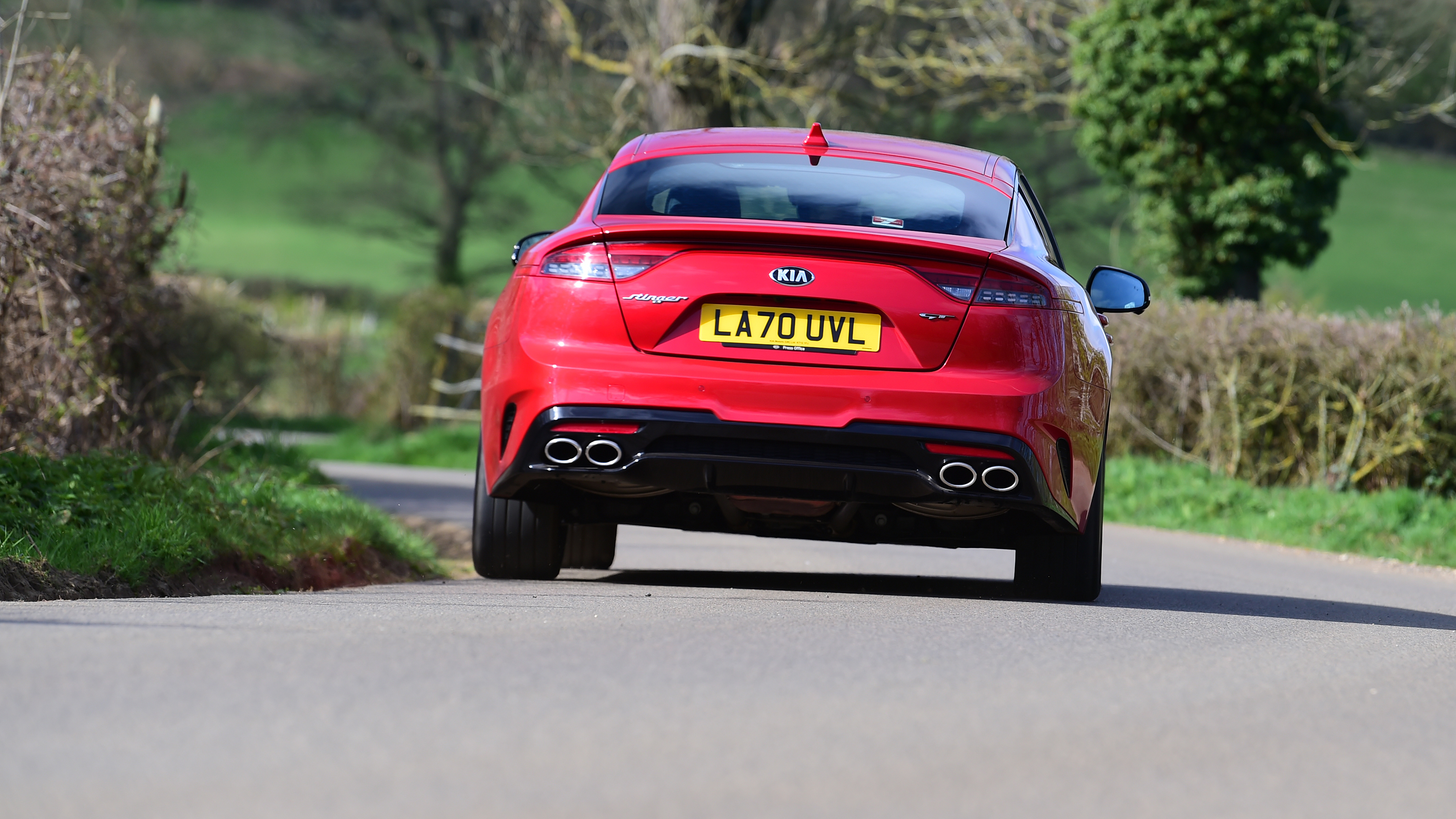 2021 Kia Stinger driving - rear view