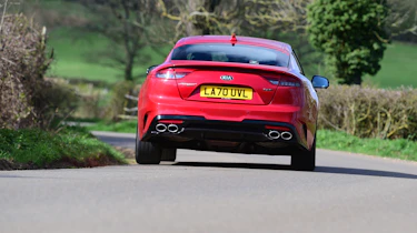 2021 Kia Stinger driving - rear view