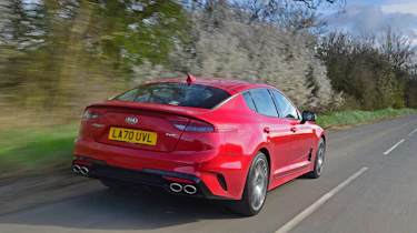 2021 Kia Stinger driving - rear