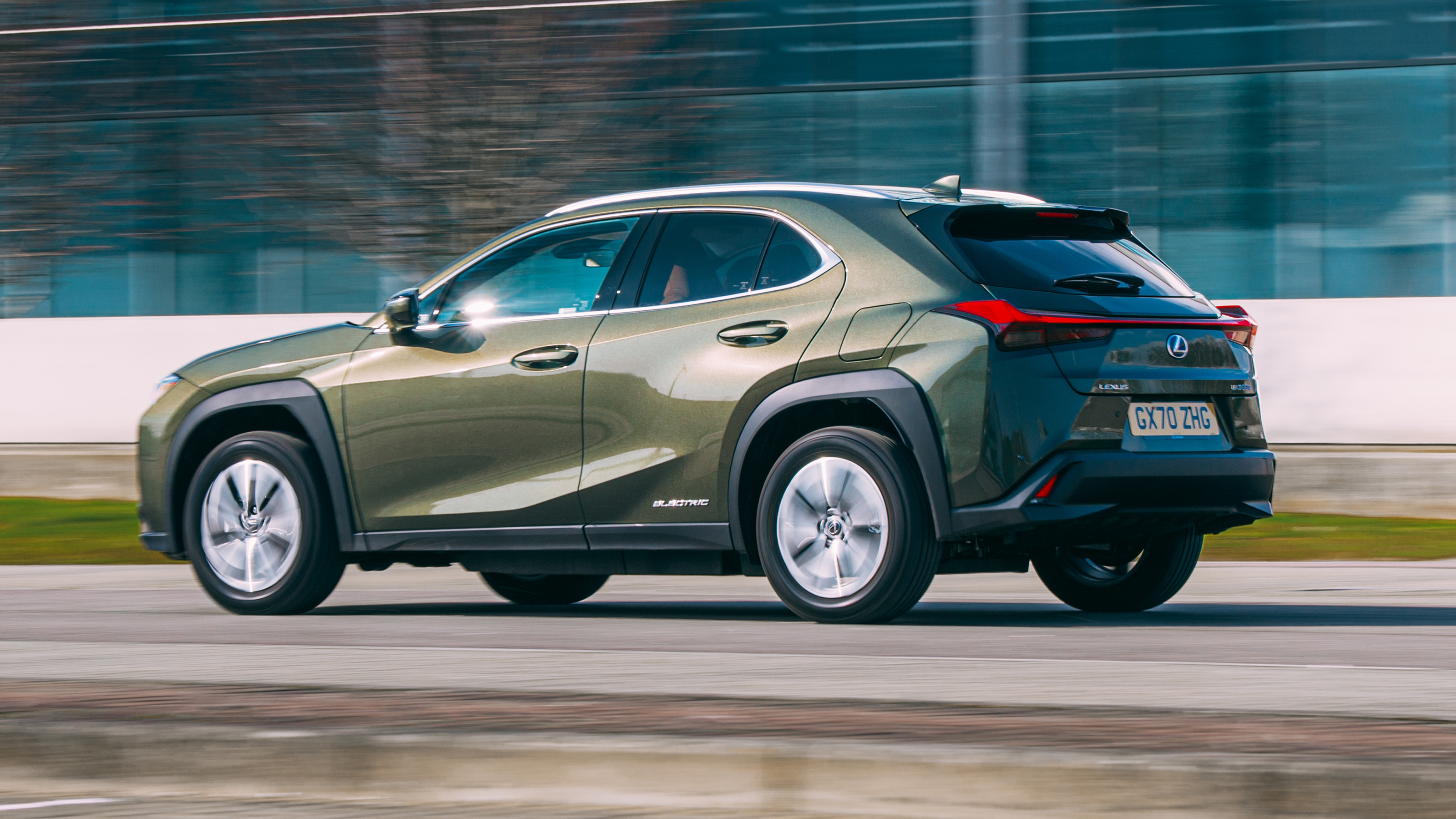 Lexus UX 300e SUV rear 3/4 panning