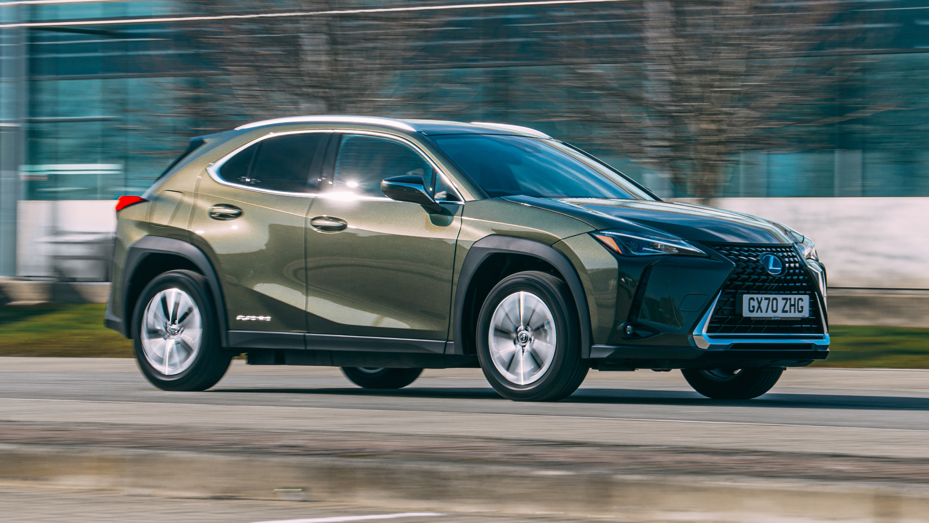 Lexus UX 300e SUV front 3/4 panning