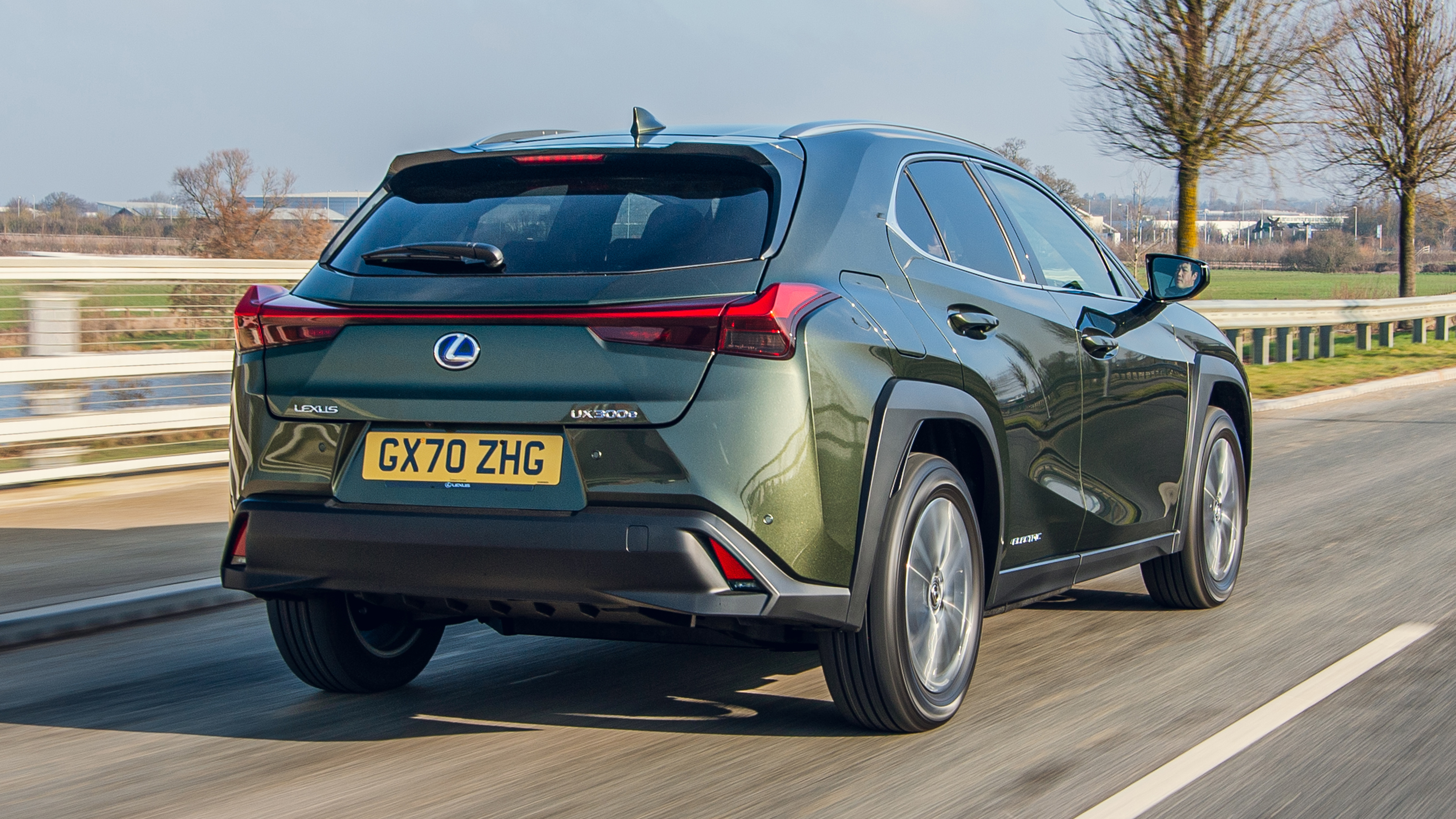 Lexus UX 300e SUV rear 3/4 tracking