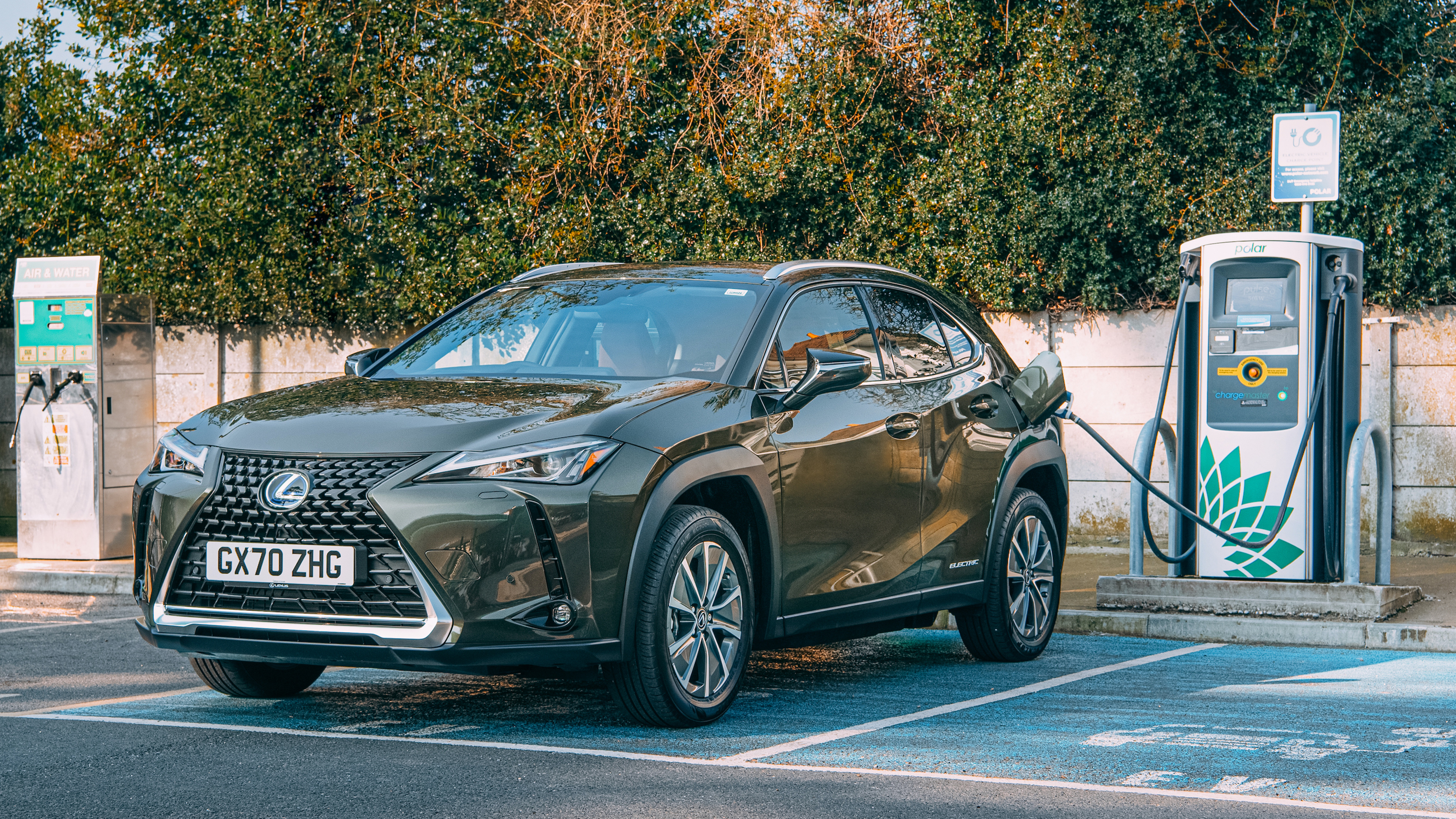 Lexus UX 300e SUV in charging bay