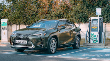 Lexus UX 300e SUV in charging bay