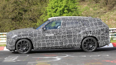 2022 BMW X8 SUV prototype - side on passing