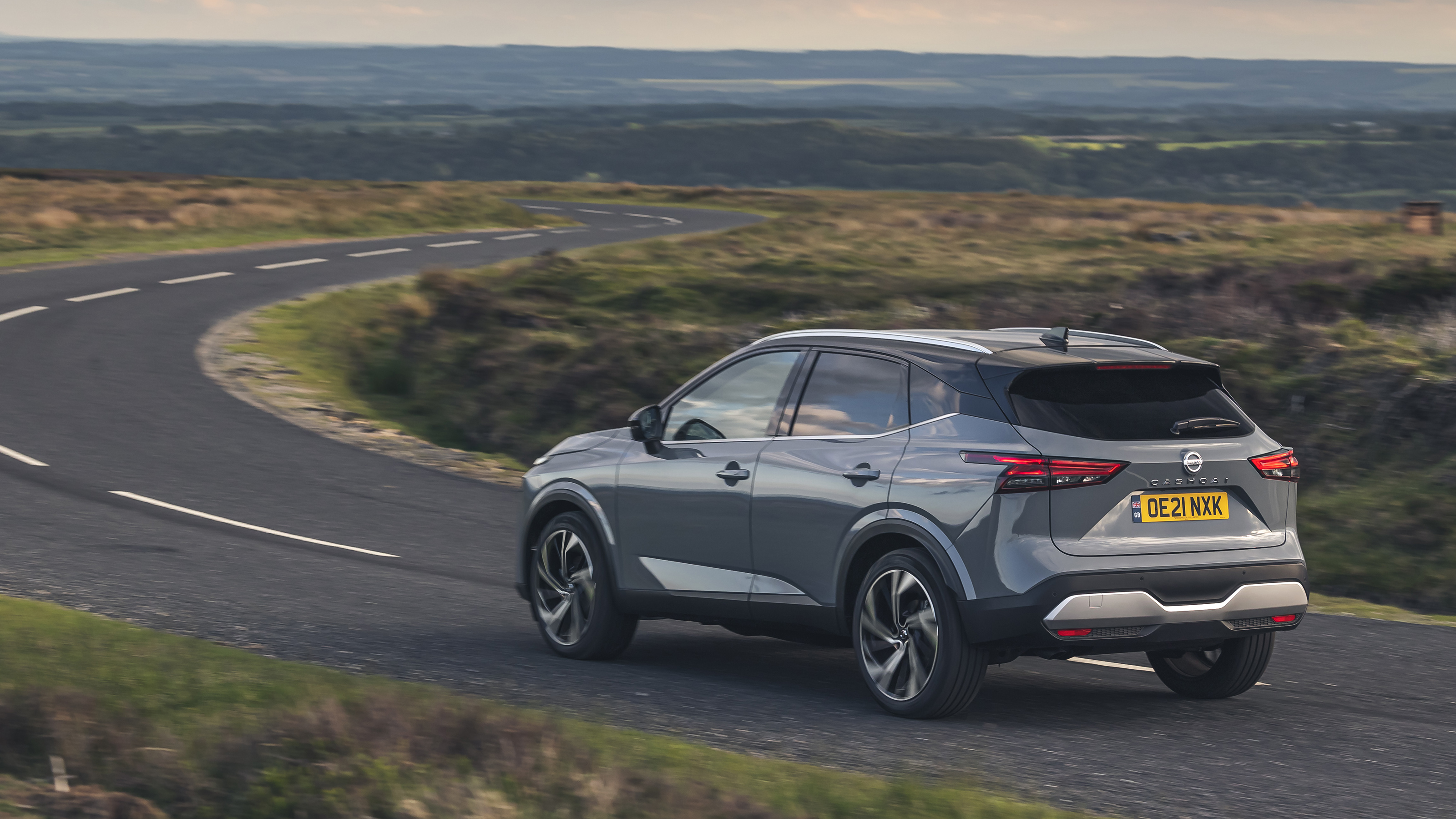 2021 Nissan Qashqai driving towards corner