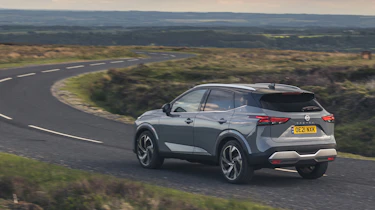 2021 Nissan Qashqai driving towards corner