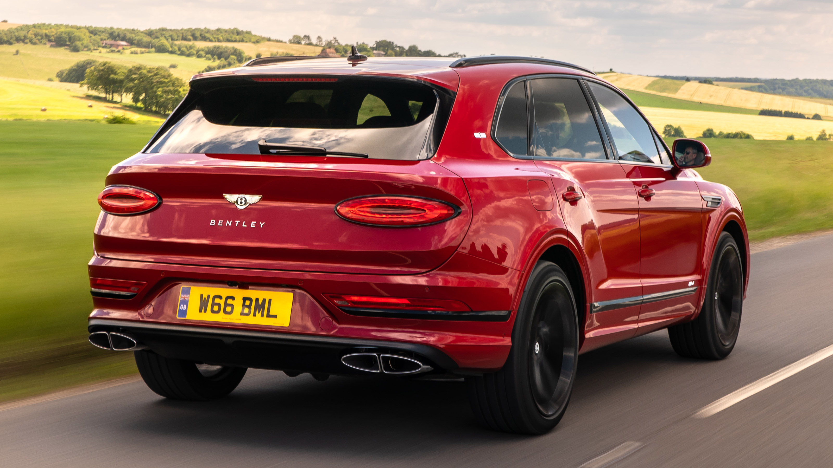 Bentley Bentayga Hybrid rear 3/4 tracking