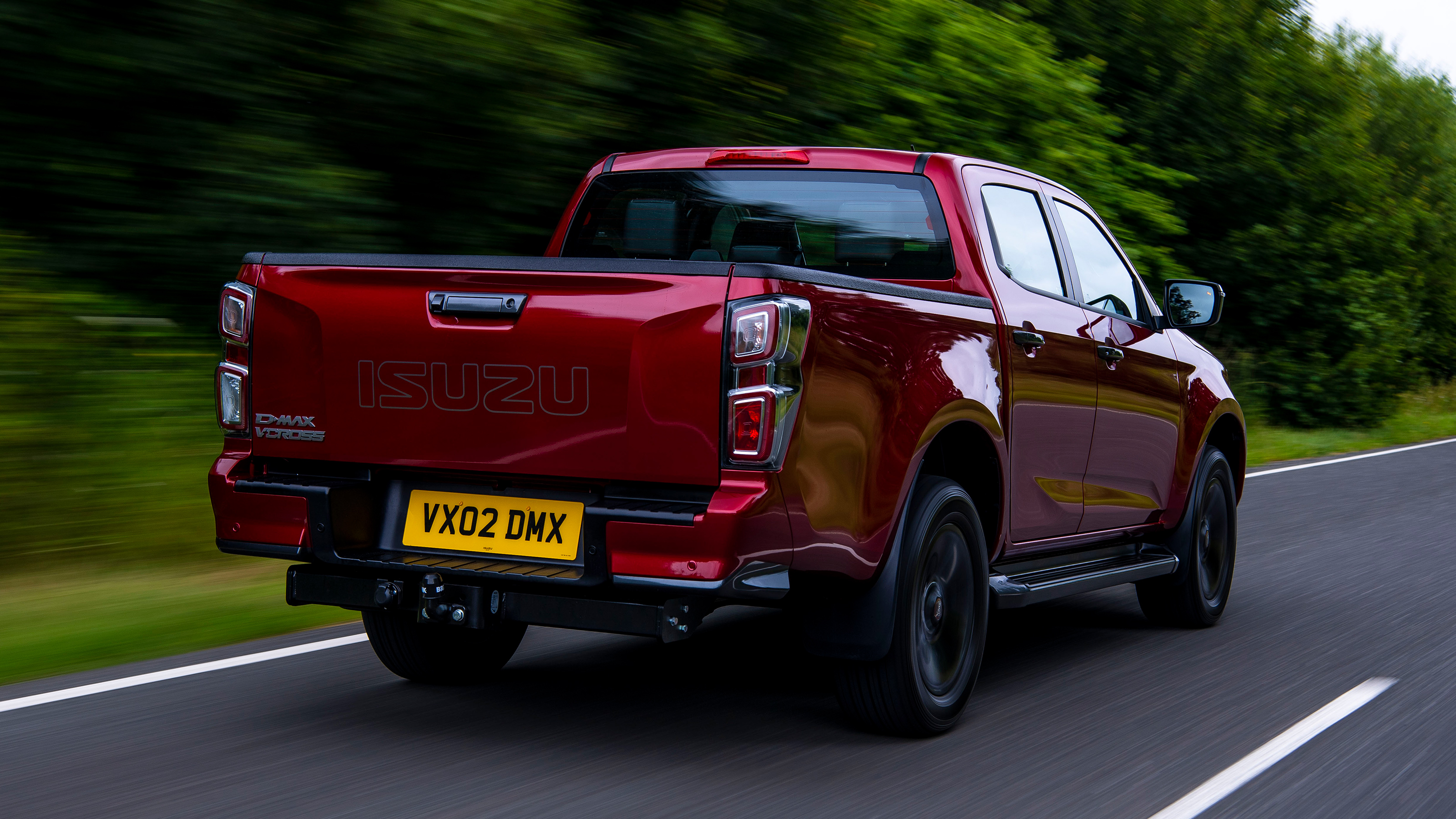 2021 Isuzu D-Max driving - rear view