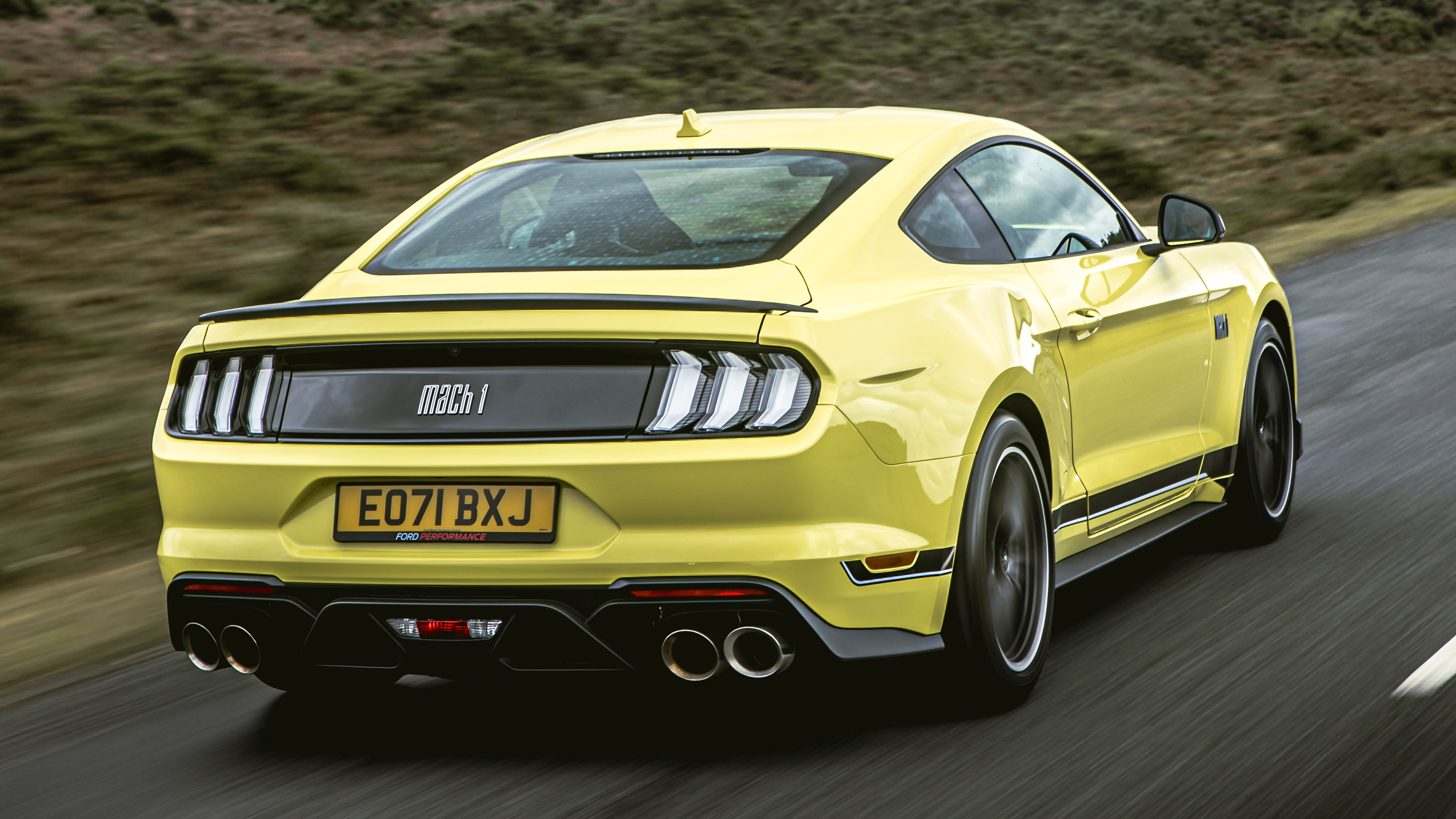Ford Mustang Mach 1 driving - rear