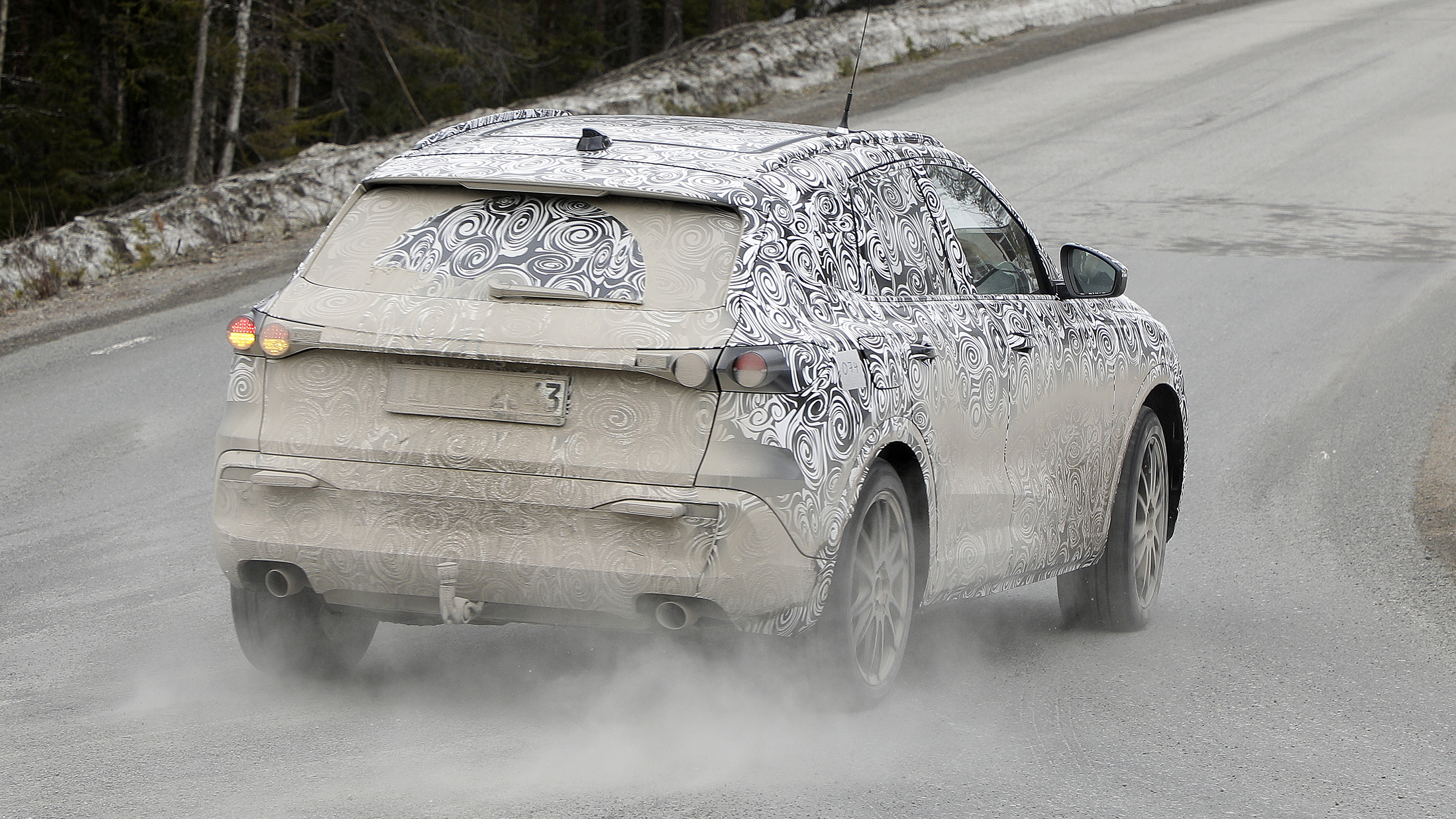 2023 Audi Q5 spy shot rear quarter