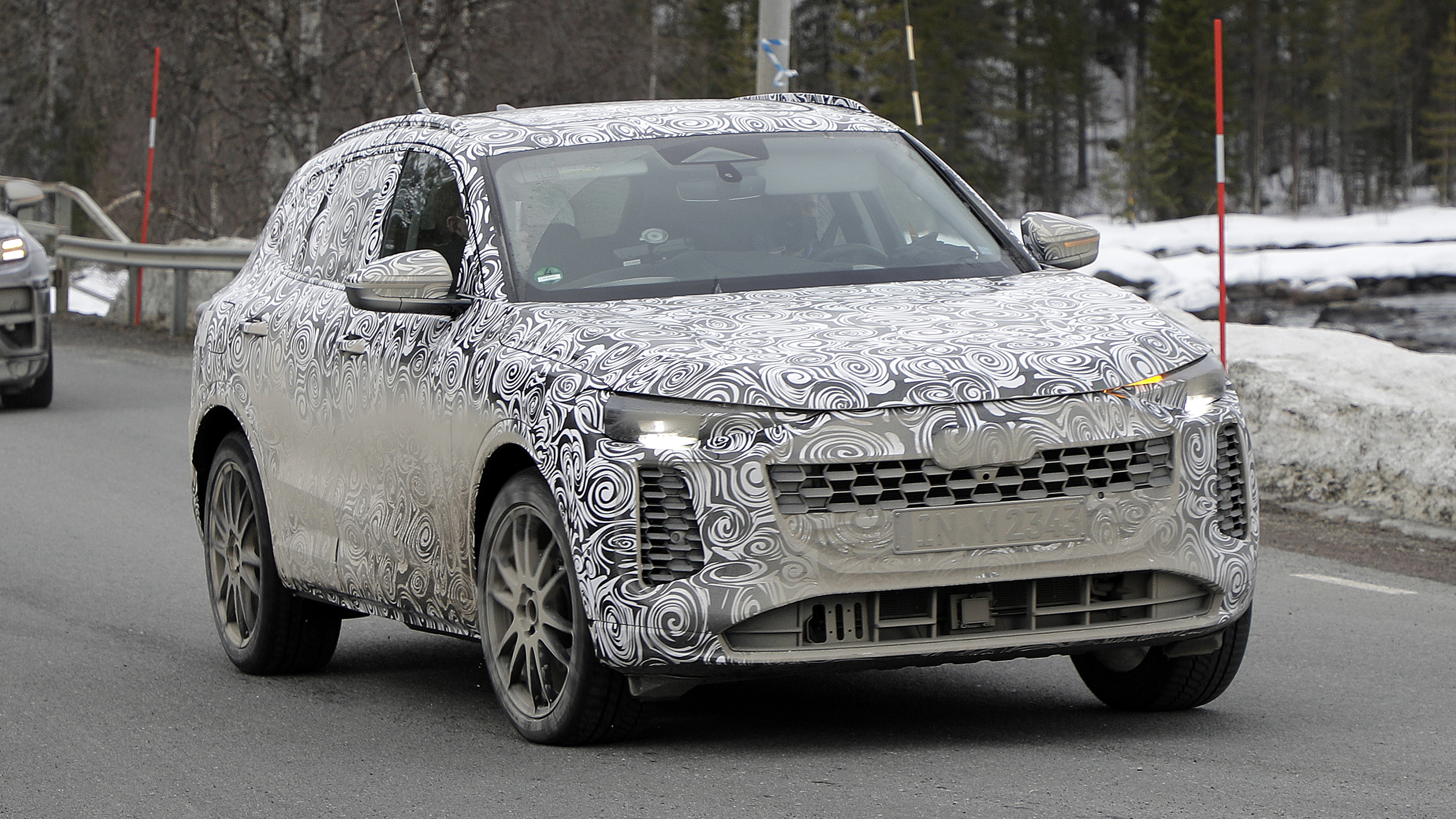 2023 Audi Q5 spy shot front quarter