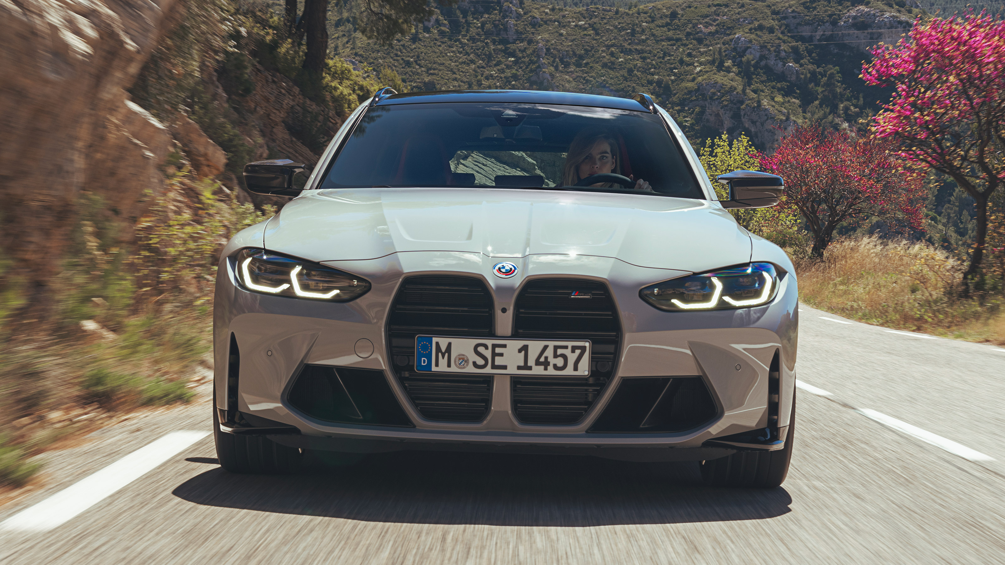 BMW M3 Touring driving - front end
