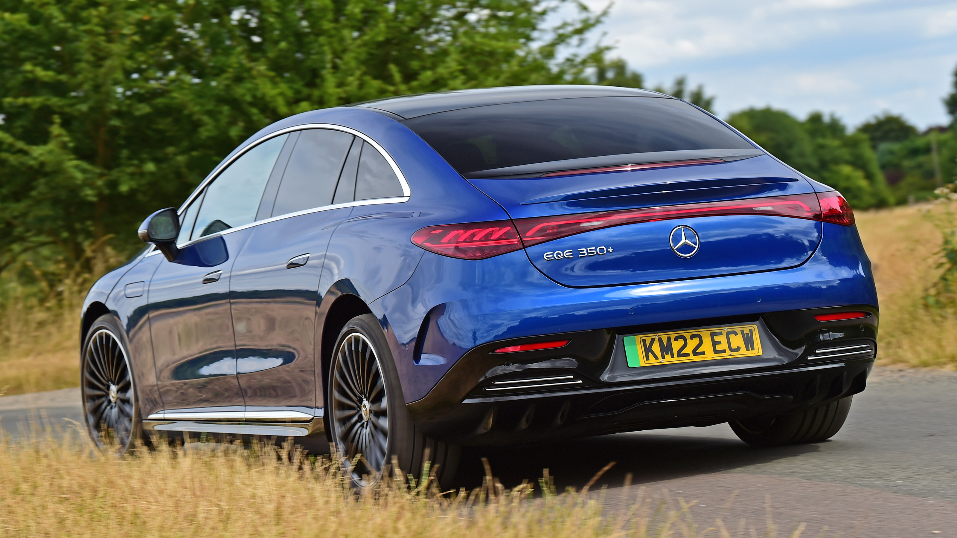 Mercedes EQE 350+ driving rear