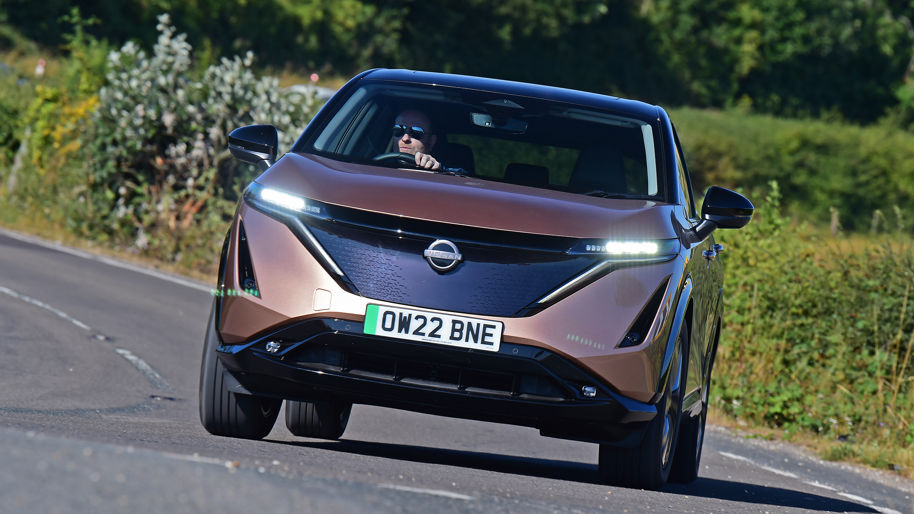 Nissan Ariya SUV front driving