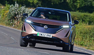 Nissan Ariya SUV front driving