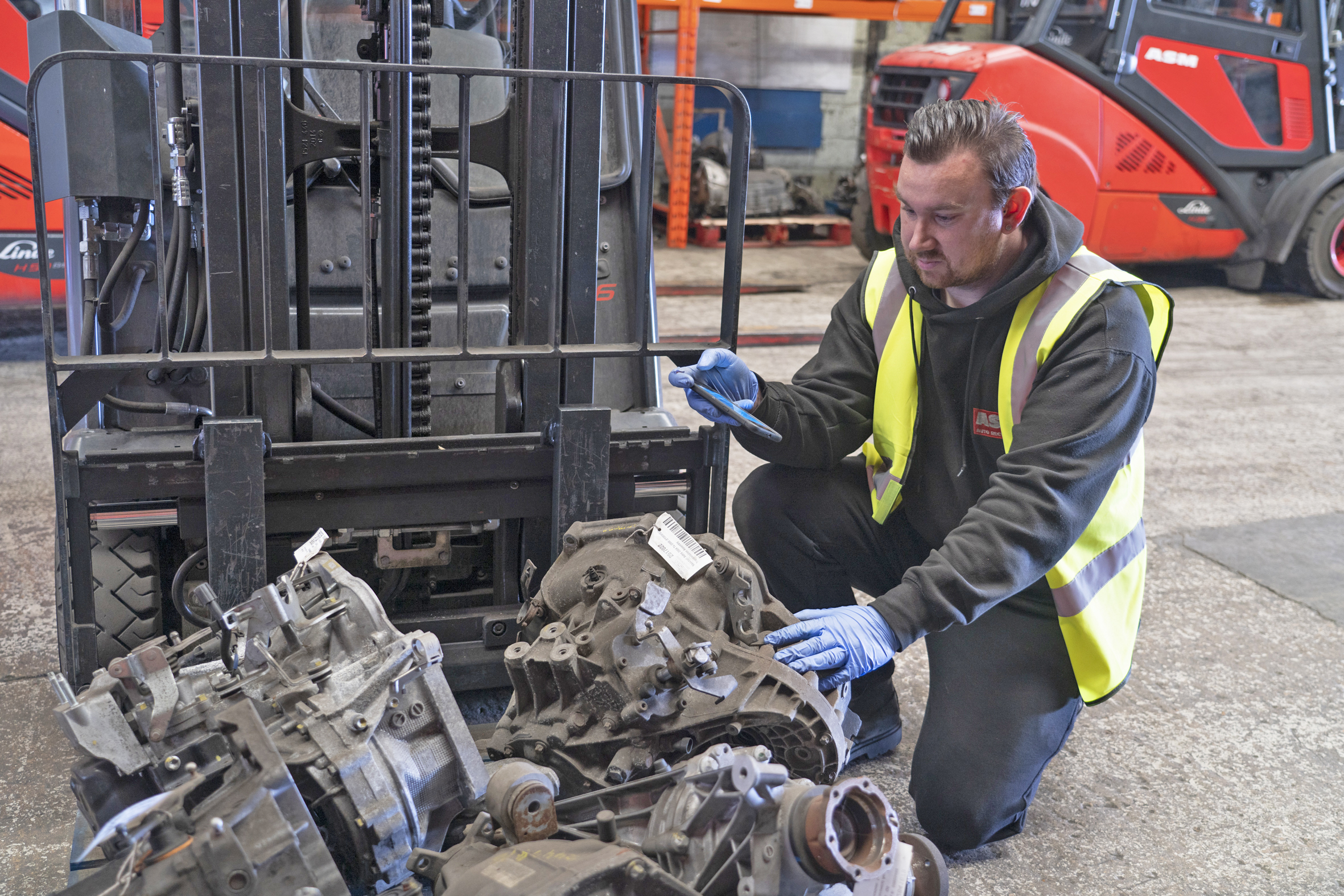 Car parts being inspected