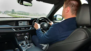 Alfa Romeo Stelvio SUV driving staff