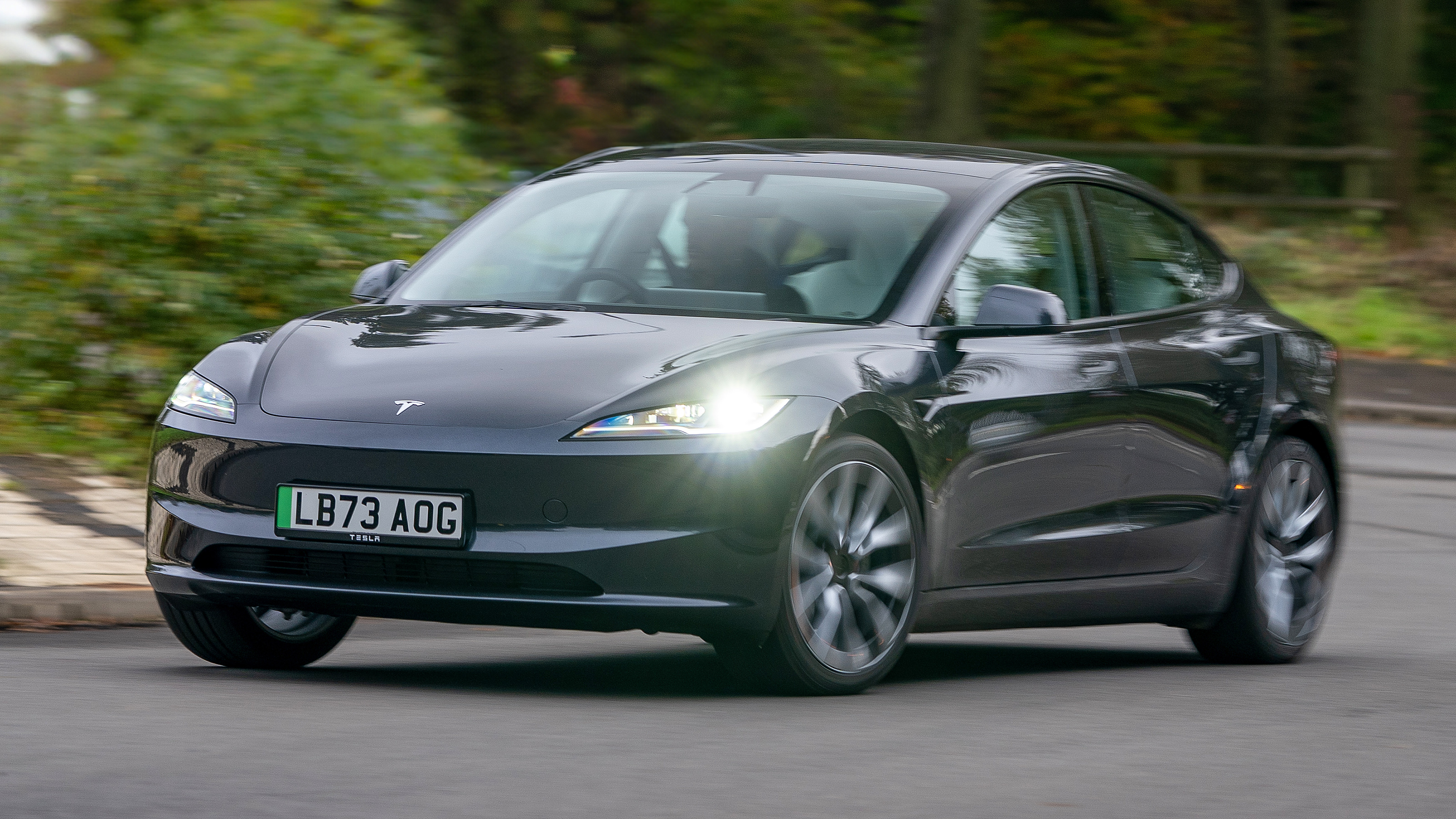 Tesla Model 3 driving