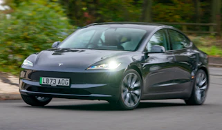 Tesla Model 3 driving