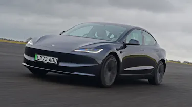 Tesla Model 3 front quarter driving