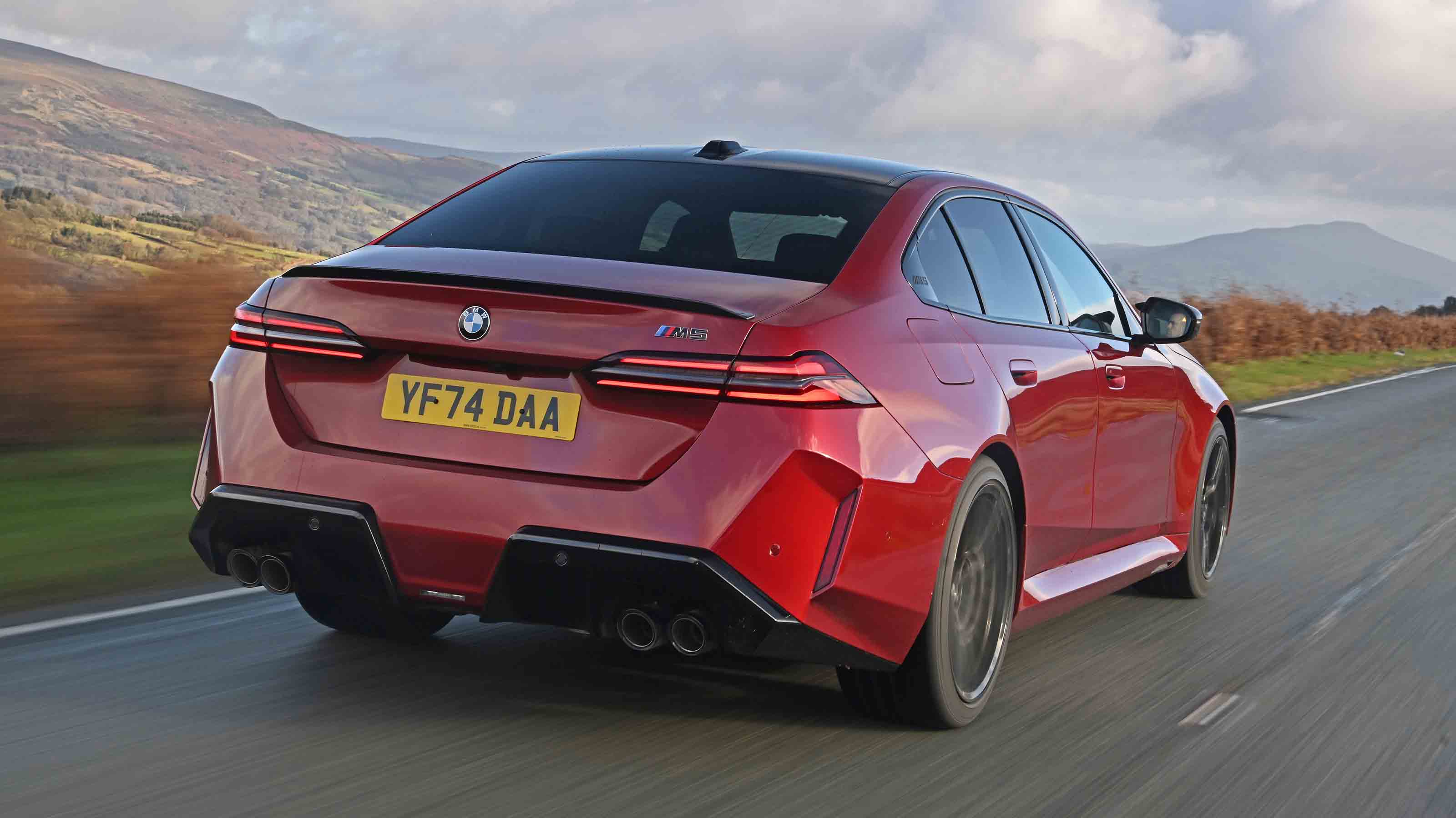 BMW M5 rear quarter driving