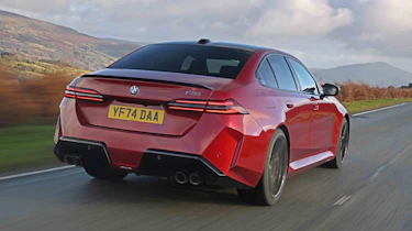 BMW M5 rear quarter driving