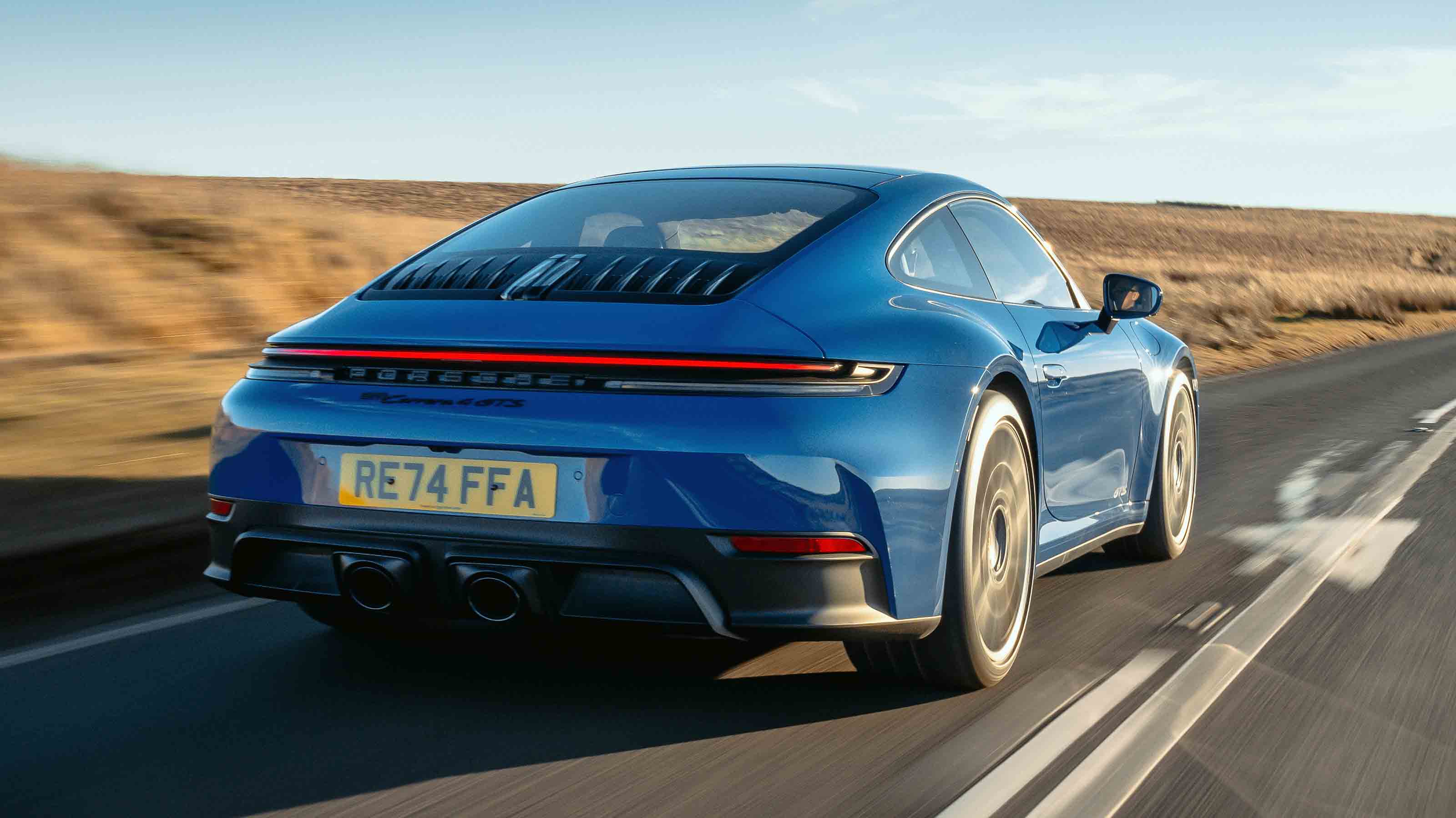 Porsche 911 Carrera GTS rear 3/4 dynamic