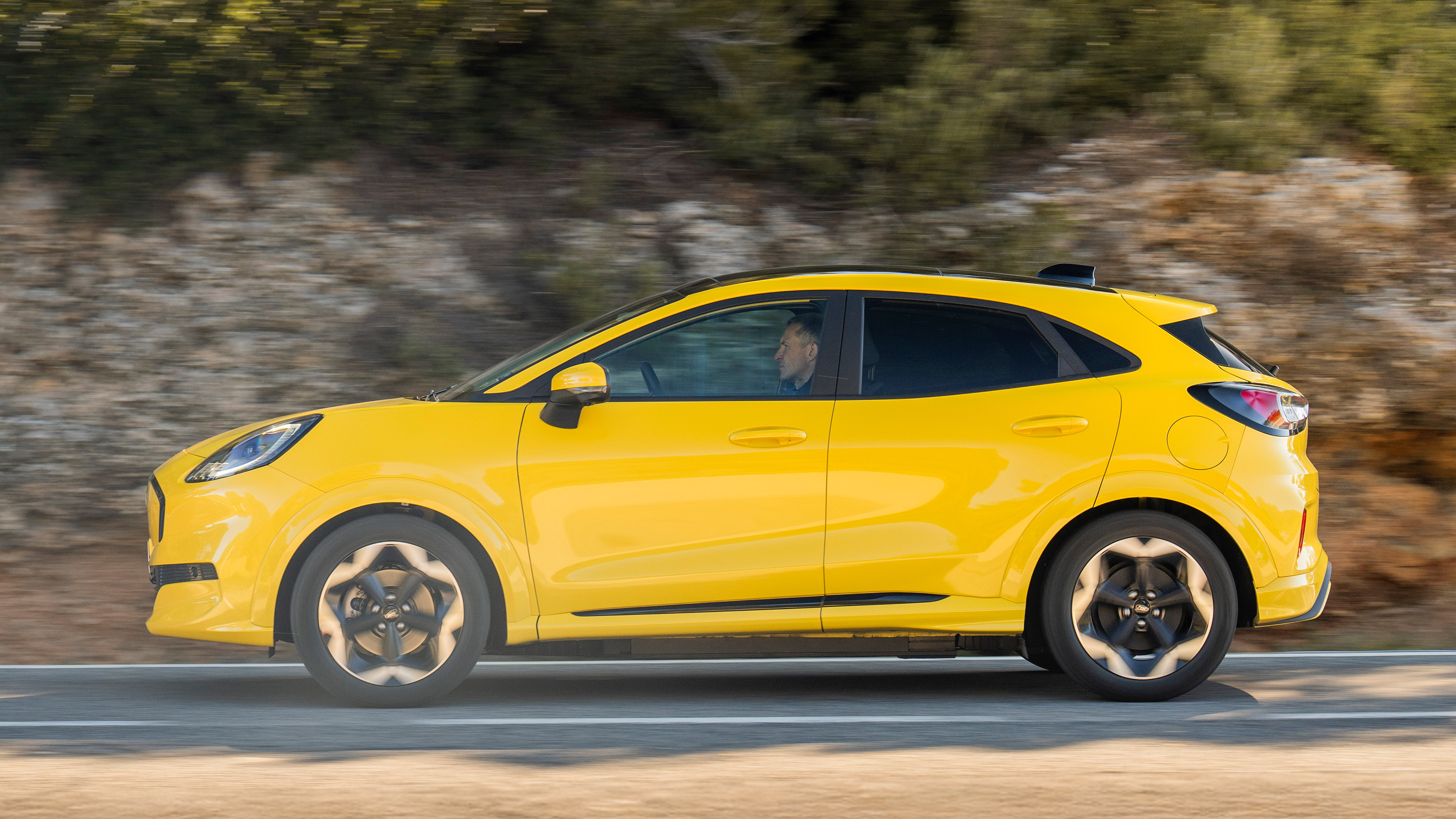Ford Puma Gen-E side profile driving
