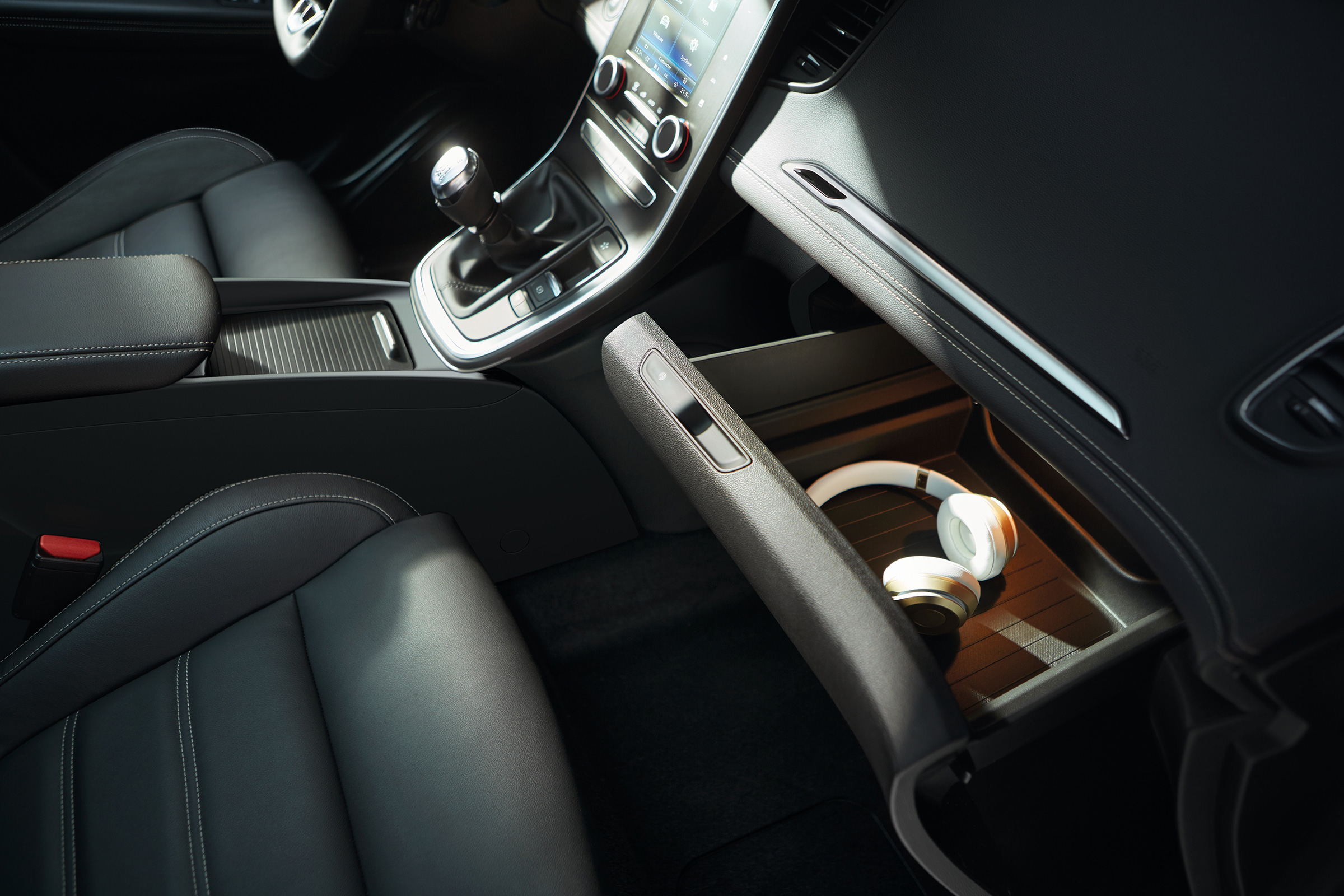Interior storage spaces abound, with Renault claiming there are 63 in total