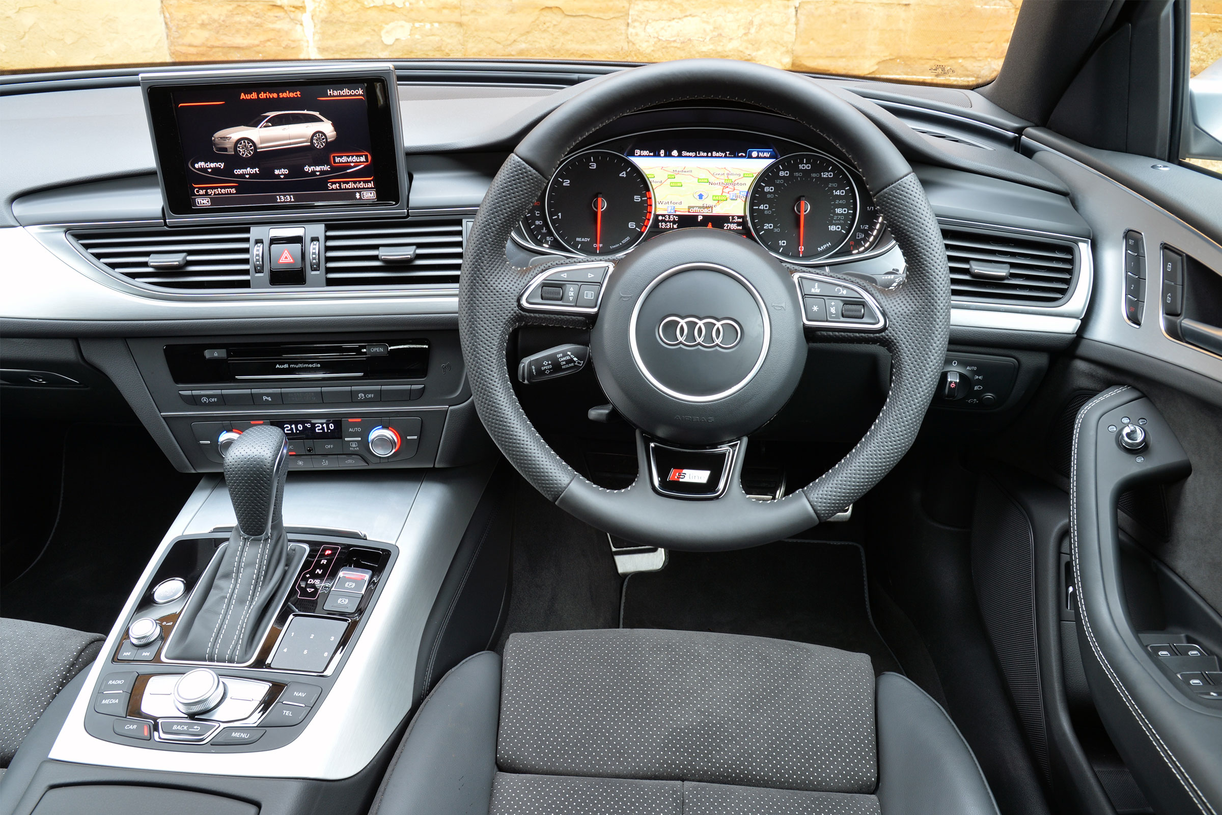 Inside, there's plenty of leather and large central infotainment screen
