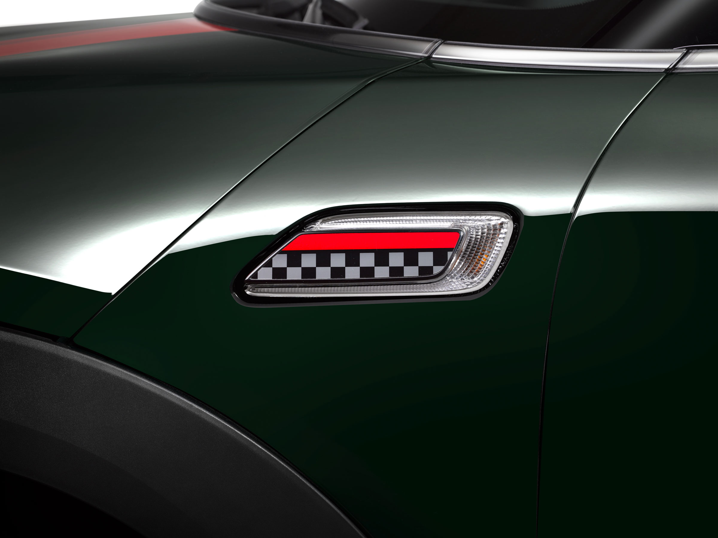 There are plenty of hints to John Cooper's race past