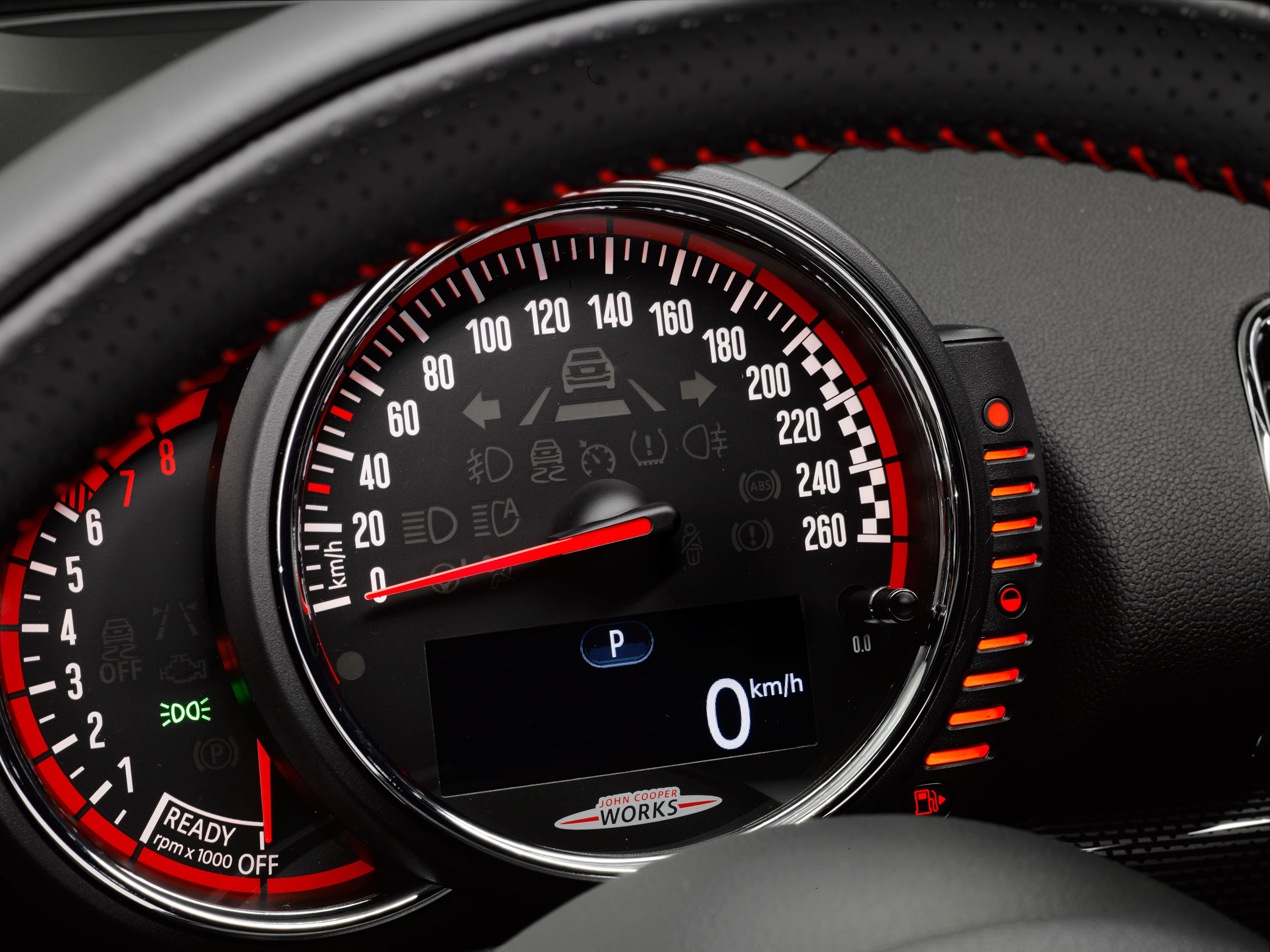 The speedometer, rev counter and fuel gauge sit in a pod in front of the steering wheel