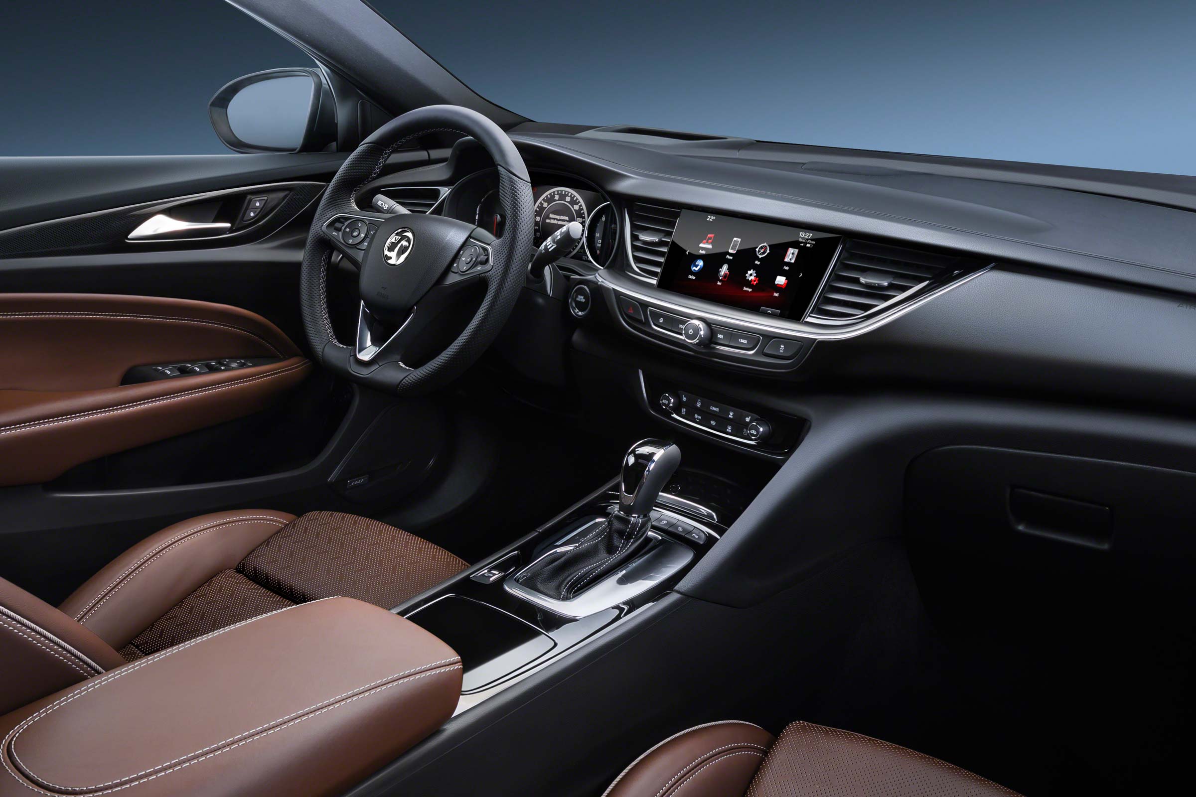 The Insignia Grand Sport is impressively sleek inside, with a frameless touchscreen taking pride of place