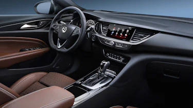 The Insignia Grand Sport is impressively sleek inside, with a frameless touchscreen taking pride of place