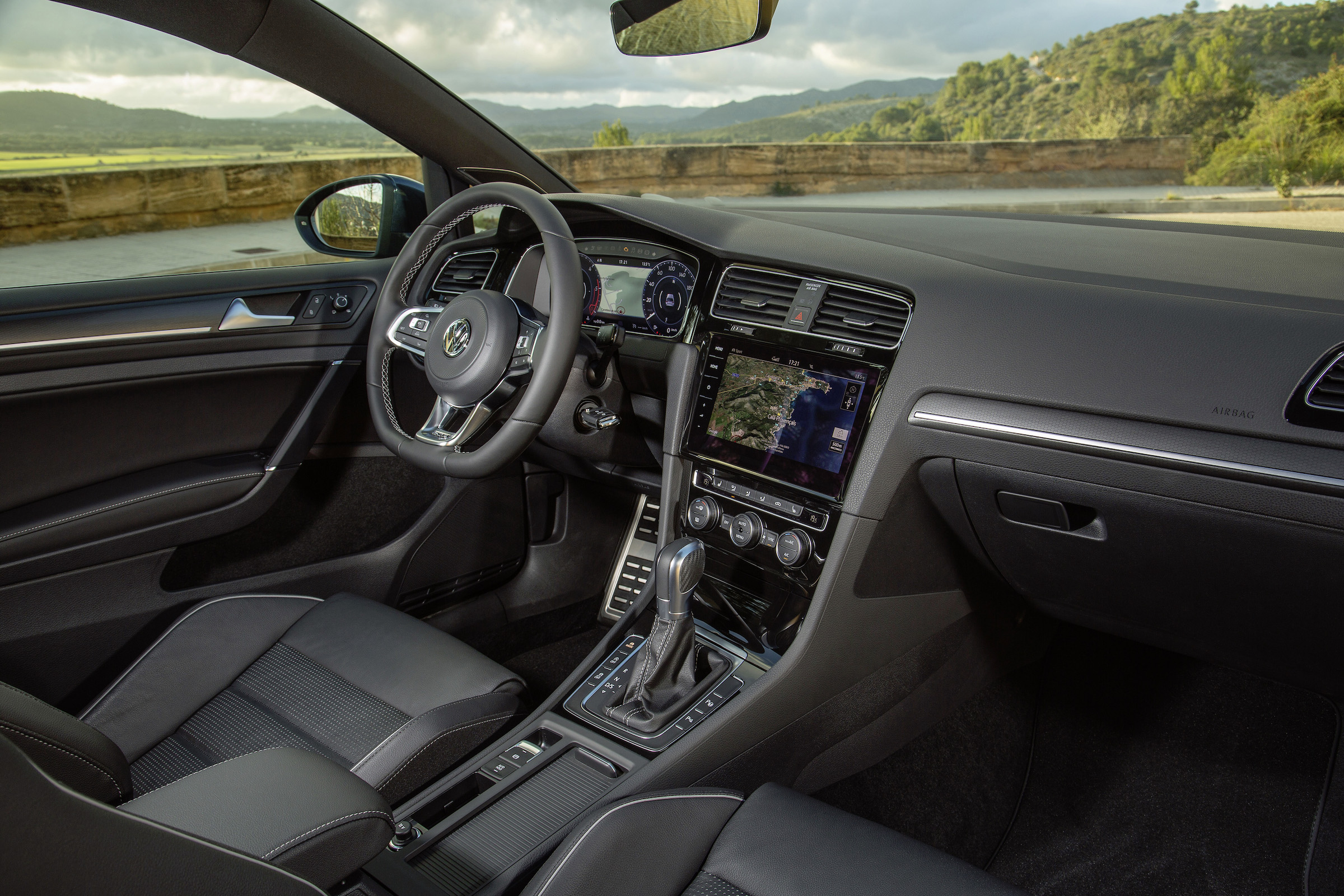 The optional Tartan-style cloth seat material is a nod towards the Golf GTI