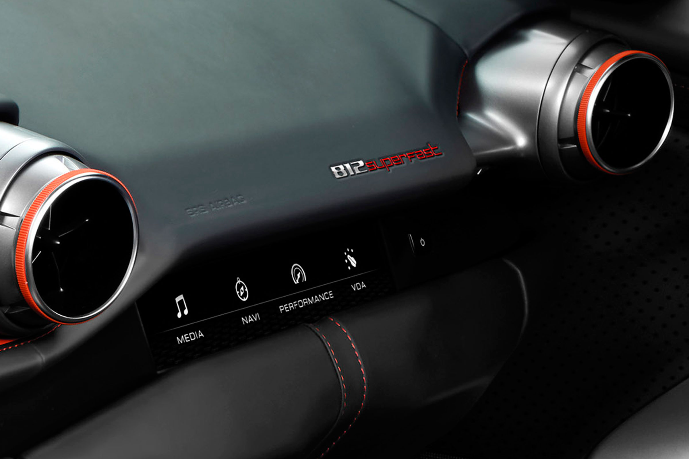 There are additional controls in front of the passenger