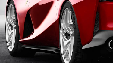 Sculpted sides are designed to funnel air to aid cooling and downforce at speed
