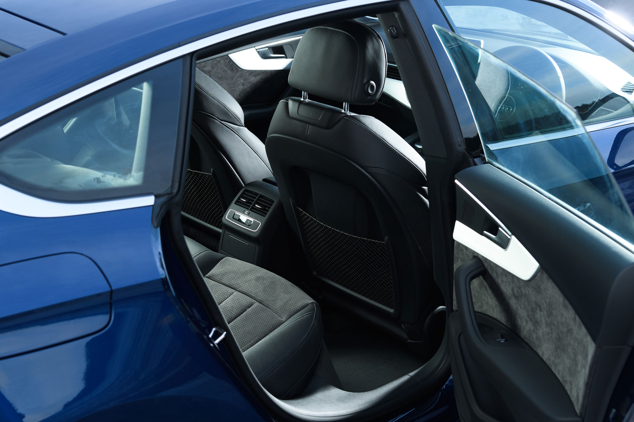 If you often carry passengers, the improved access and rear headroom of the Sportback easily beats the Coupe